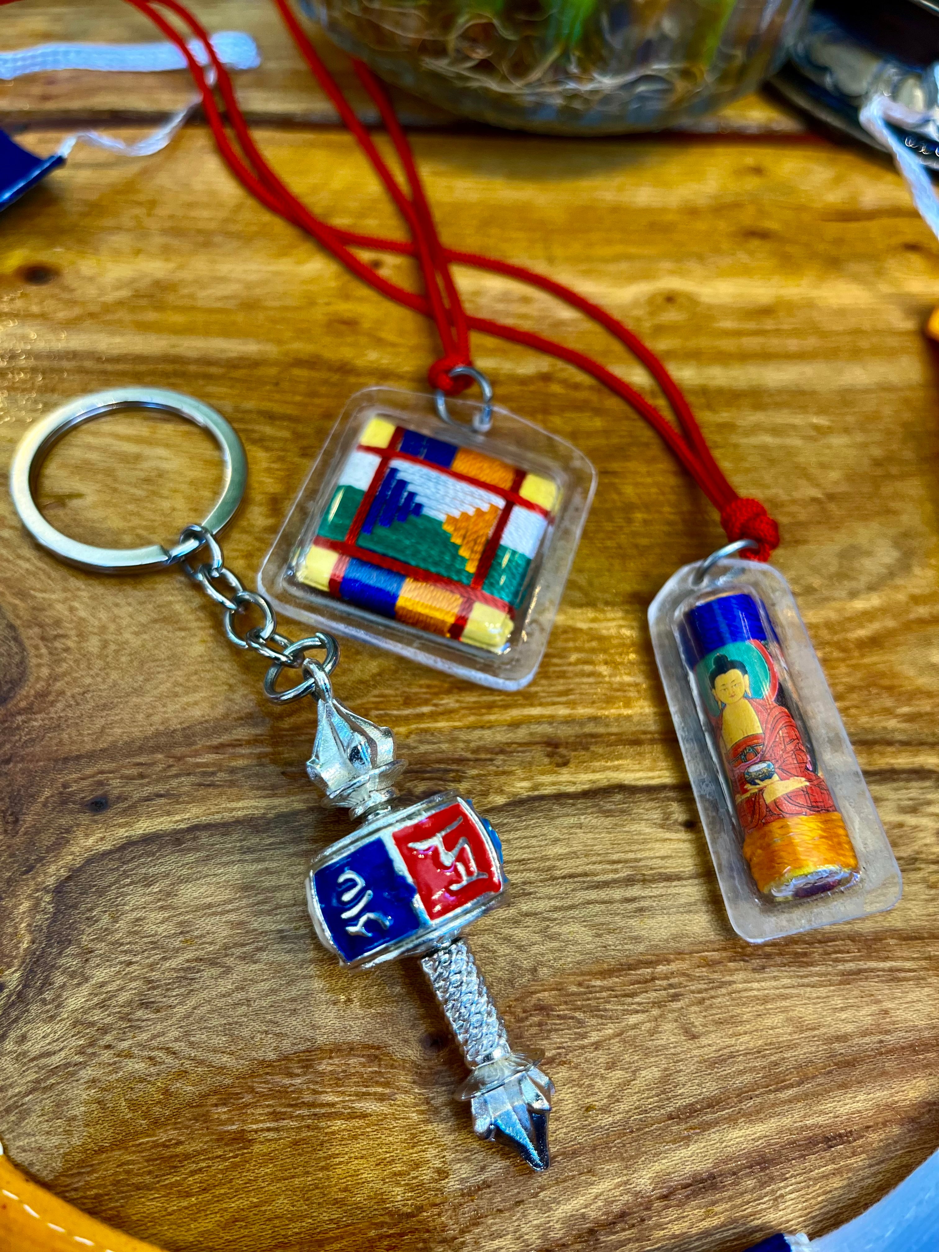 Spiritual Protection Package: Prayer Flags, Prayer Wheel Keychain, and Blessing Mandala Amulet