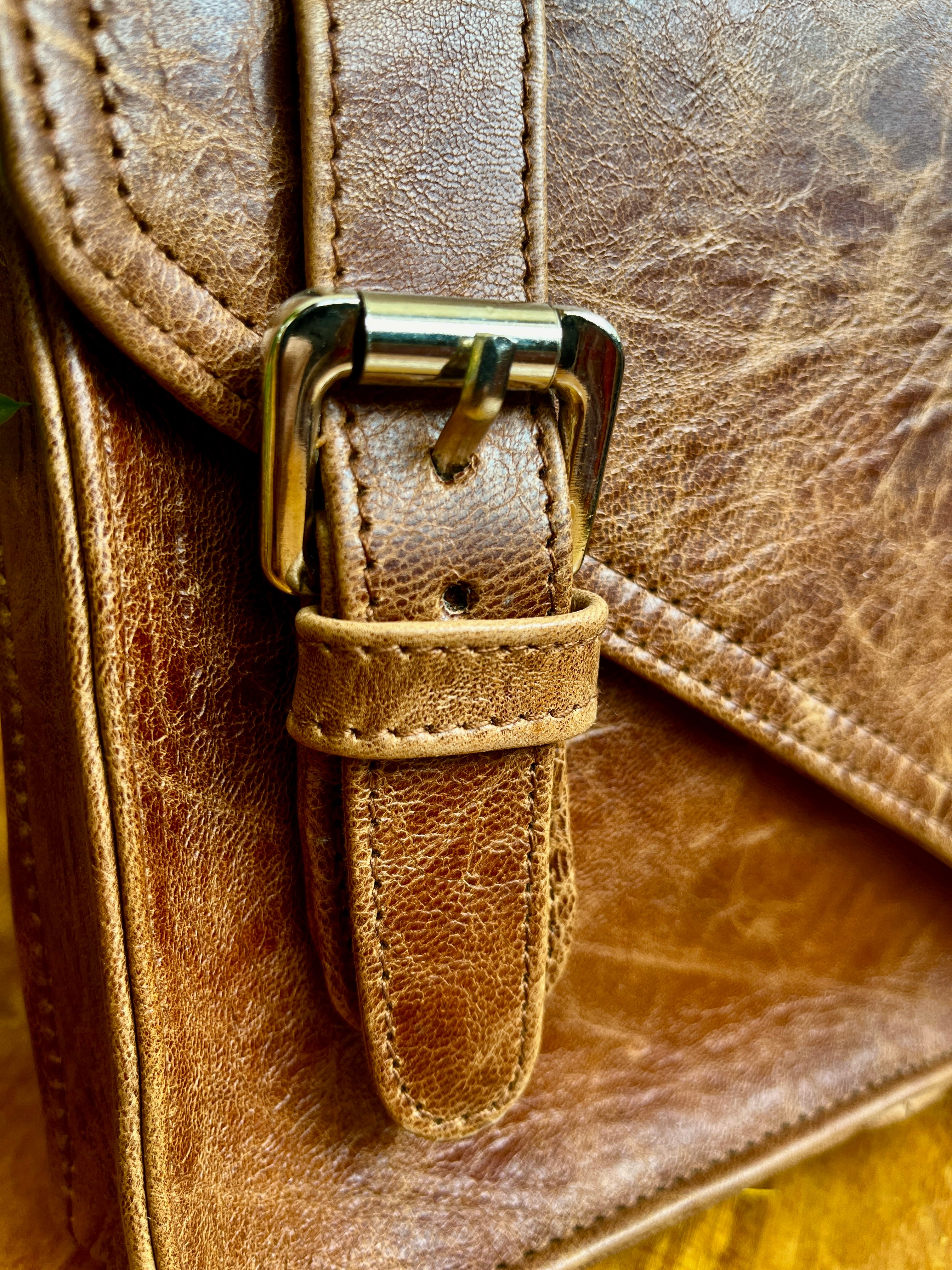 “Leather Essentials Bag: iPad, Phone, and Accessories”