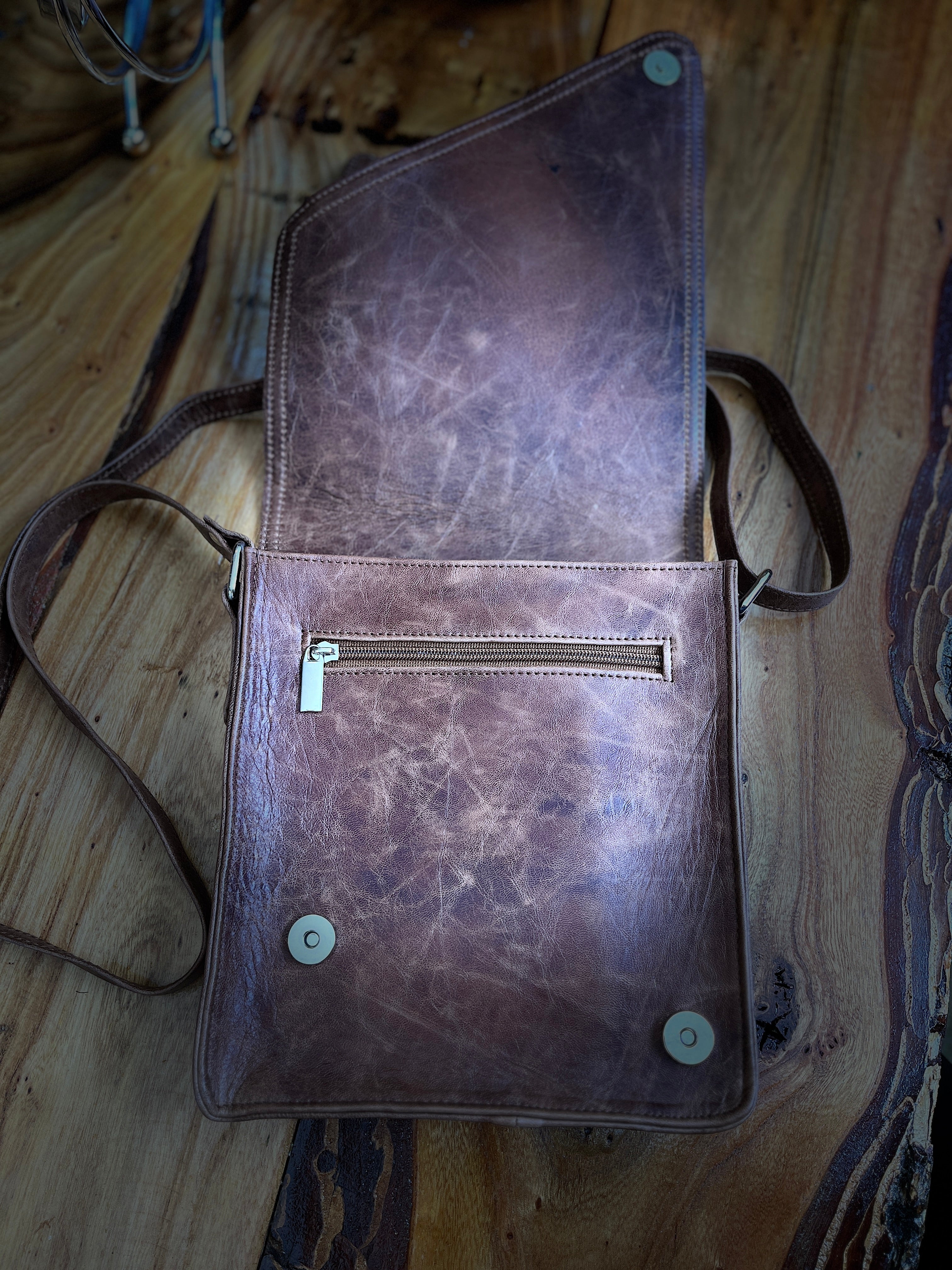 “Leather Essentials Bag: iPad, Phone, and Accessories”