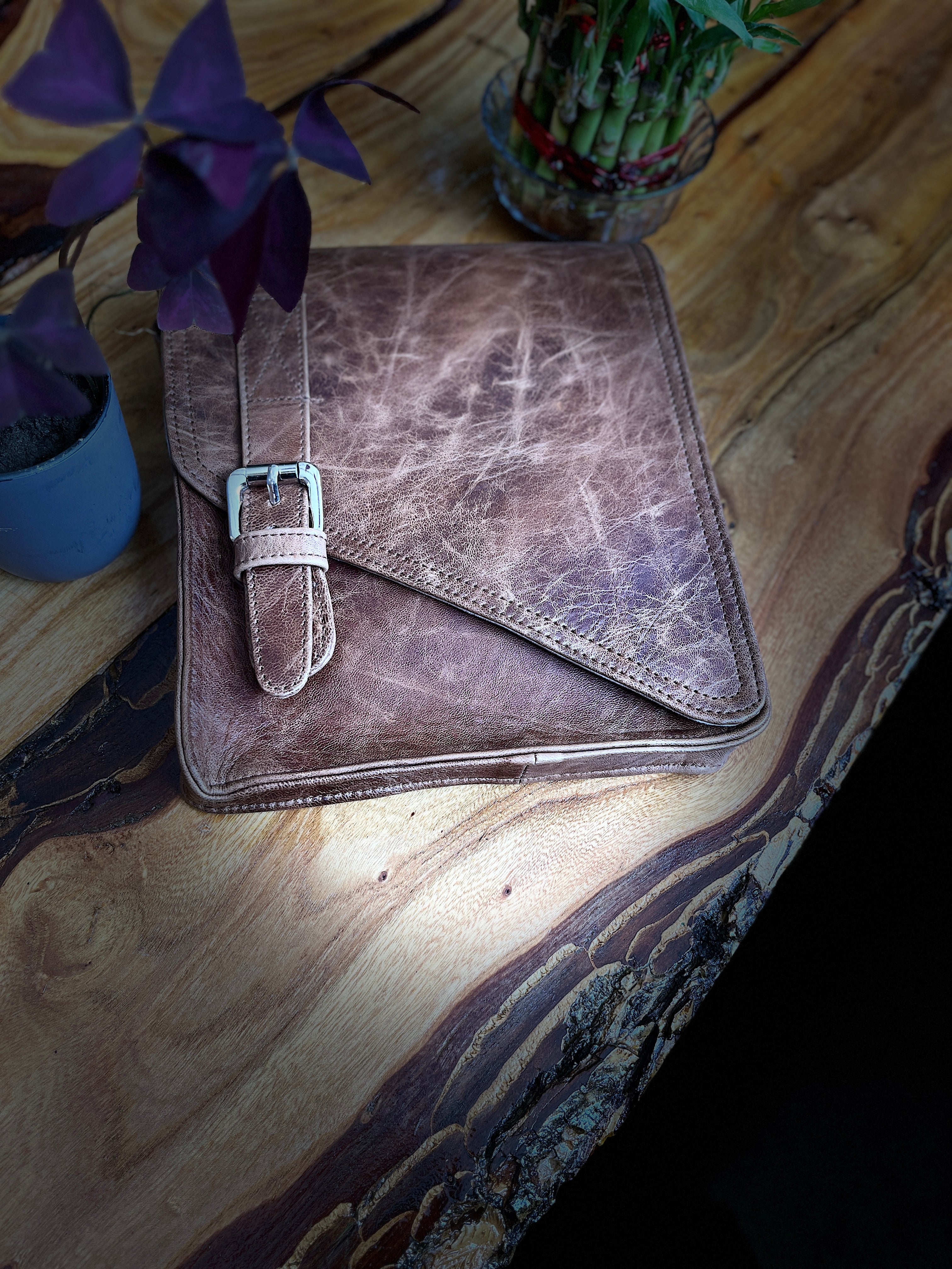 “Leather Essentials Bag: iPad, Phone, and Accessories”