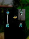 Elegant Blue Topaz and Moonstone Dangling Earrings in 92.5 Silver